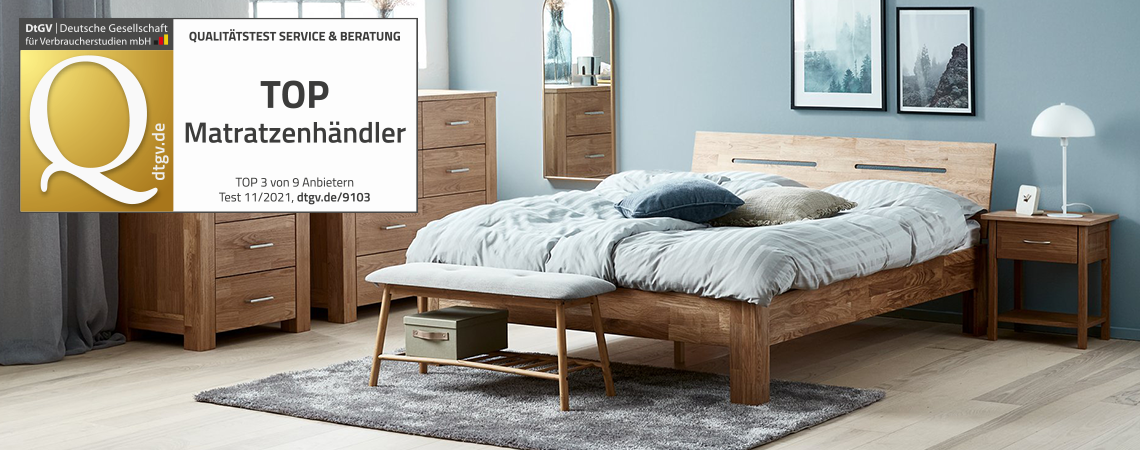 Top Matratzenhändler Logo - Ein Schlafzimmer mit Fokus auf die Matratze