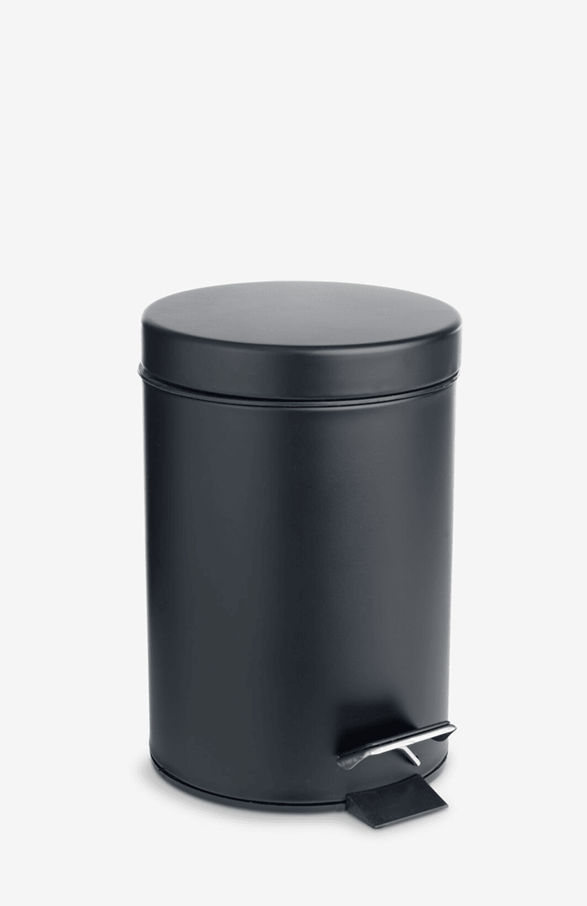 Bathroom bins Round matte black pedal bin with a foot lever, shown against a plain white background.