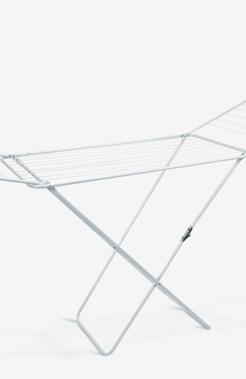 Clothes airers White foldable X-frame clothes airer with multiple drying bars, shown against a plain white background.