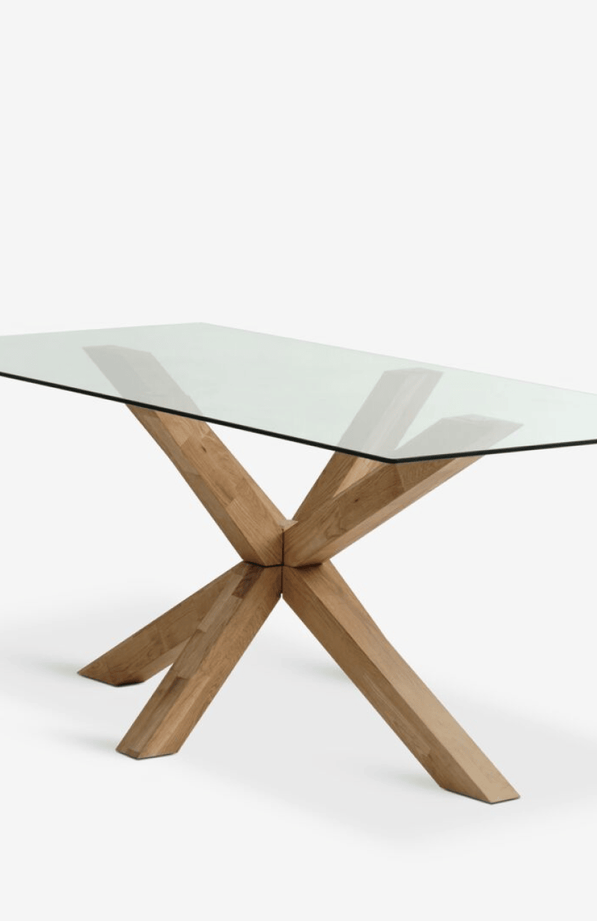 Dining tables Rectangular glass-top dining table with a crossed oak leg base, shown against a plain white background.
