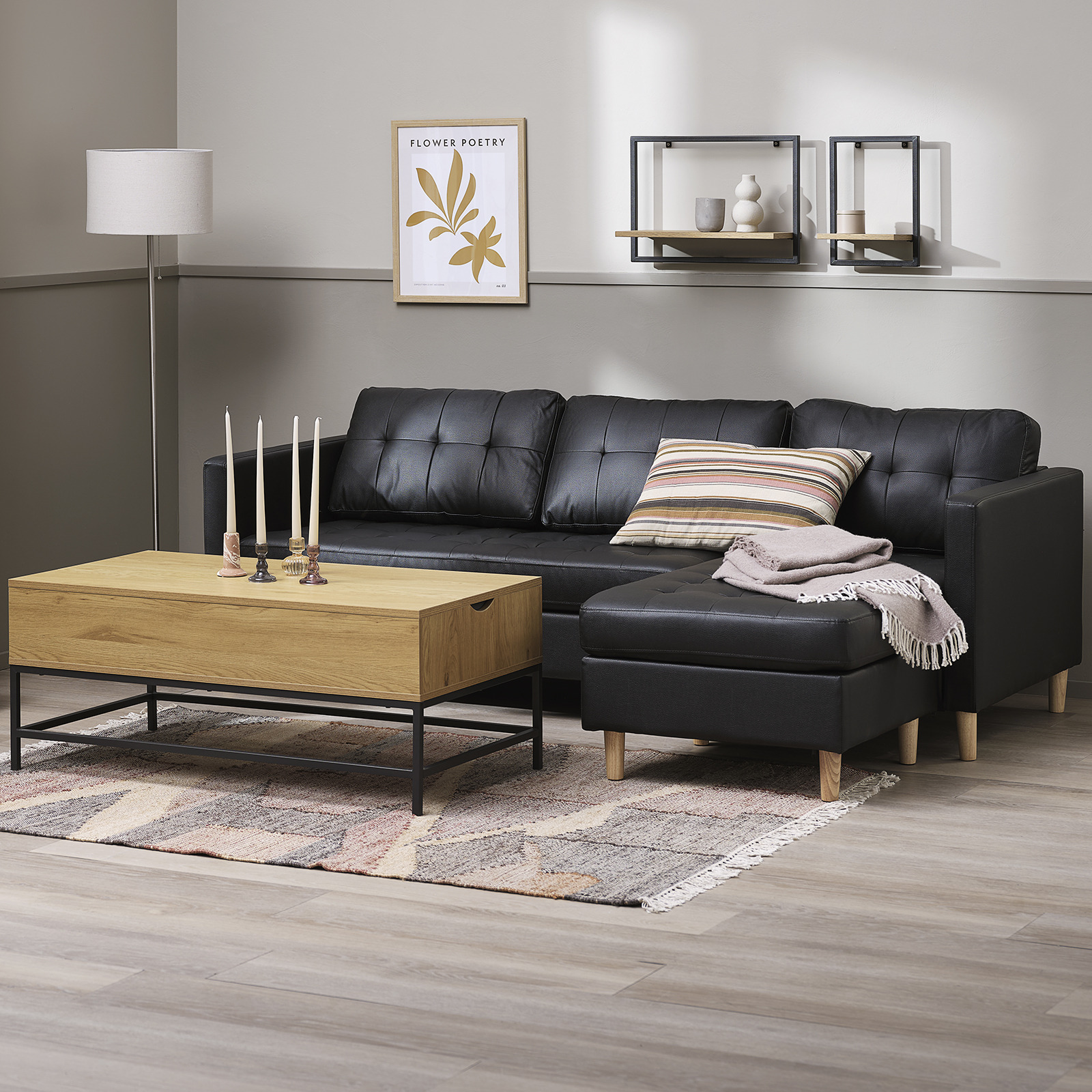 FALSLEV Sofa in schwarz mit Chaiselongue aus Kunstleder Schwarzes Sofa mit Chaiselongue