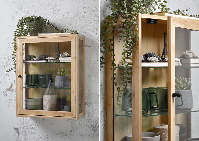 Hängeschrank RIBE Hängeschrank mit Glasfront, auf dem dekorative Ornamente ausgestellt sind