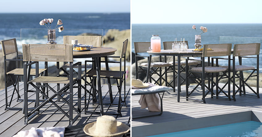 Runder ausziehbarer Gartentisch auf einer Terrasse am Meer