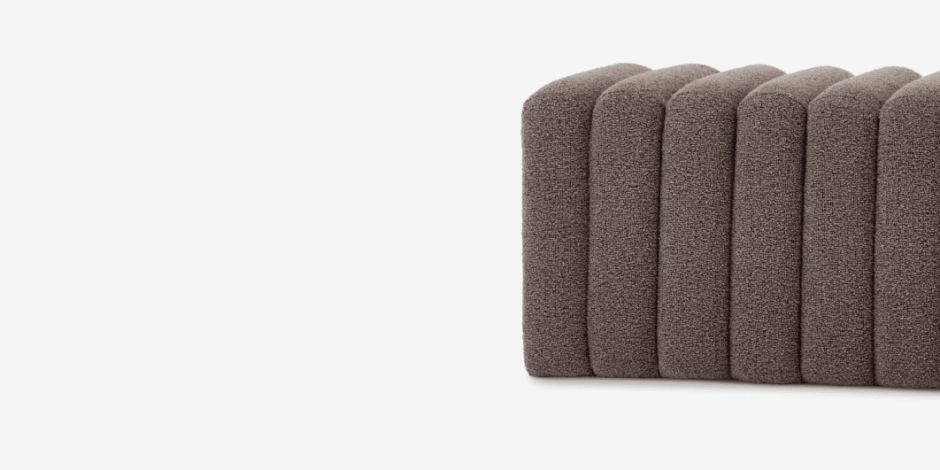 Benches Channel-tufted brown bouclé bench with vertical ribbed cushioning, shown against a plain white background.