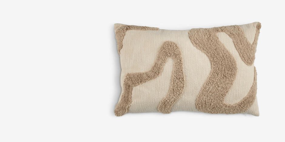 Cushions Cream lumbar cushion with a tufted beige abstract swirl pattern, shown against a plain white background.