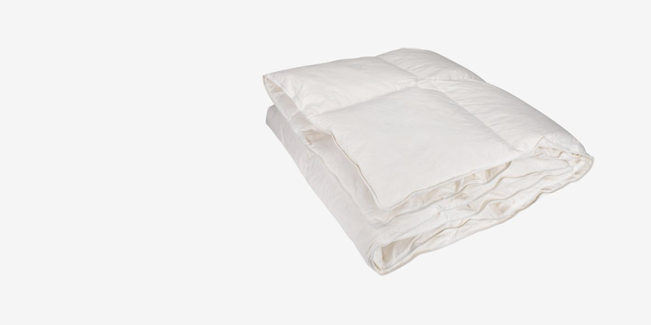 Duvets Folded white duvet with a quilted box pattern, shown against a plain light grey background.