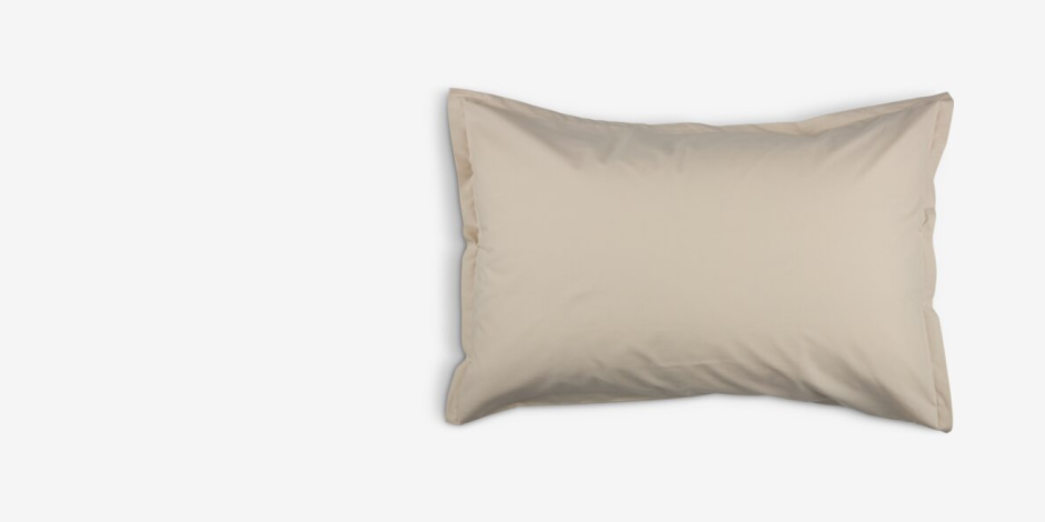 Pillowcases Beige cotton pillowcase with a flanged edge, shown against a plain light grey background.
