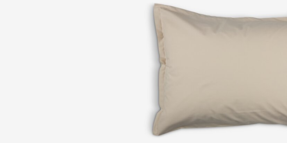 Pillowcases Beige cotton pillowcase with a flanged edge, shown against a plain light grey background.